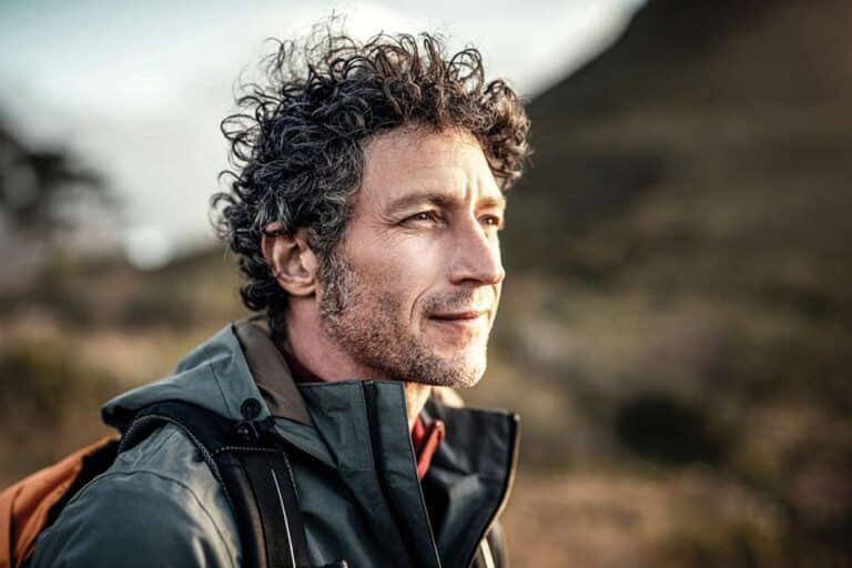 man smiling outdoors