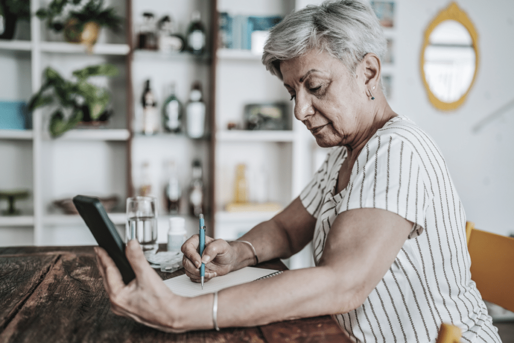 woman on her phone at home