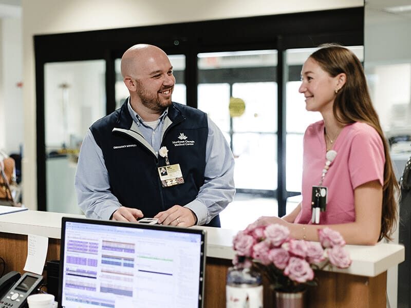 Healthcare professionals collaborating at work station